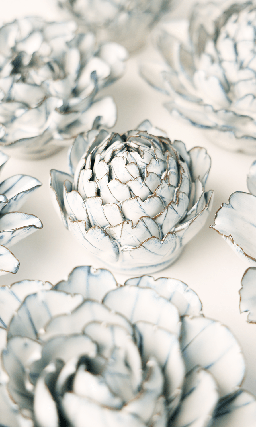 Blue White Queen Protea ceramic wall flower styled on wall — Coastal Collection — Chive Studio Toronto