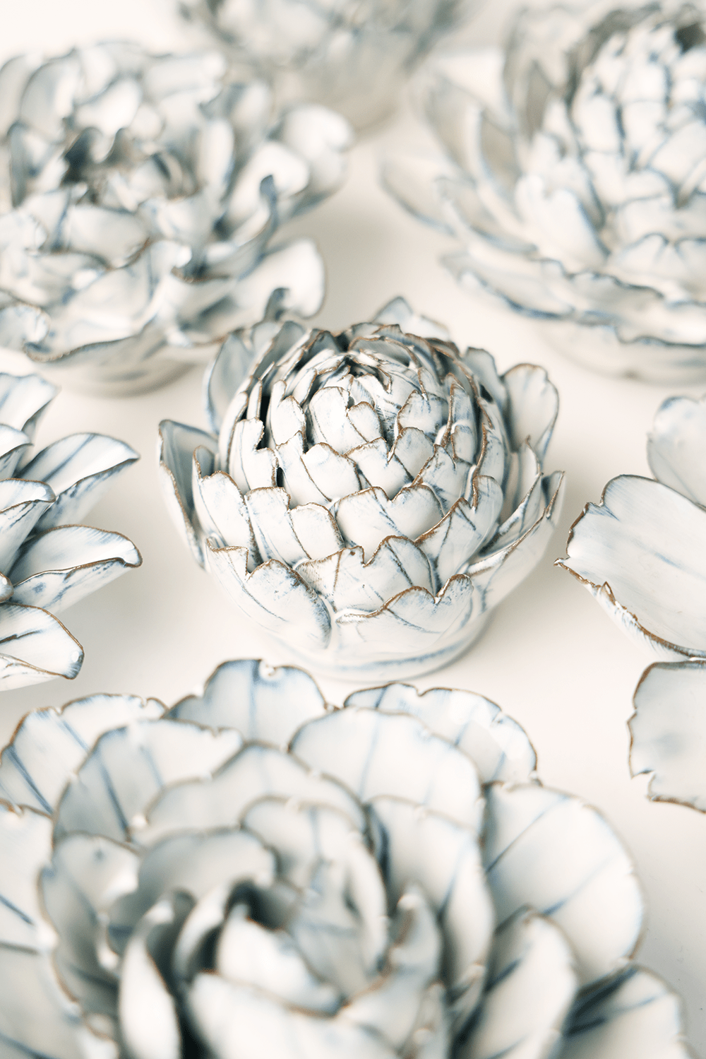 Blue White Queen Protea ceramic wall flower styled on wall — Coastal Collection — Chive Studio Toronto