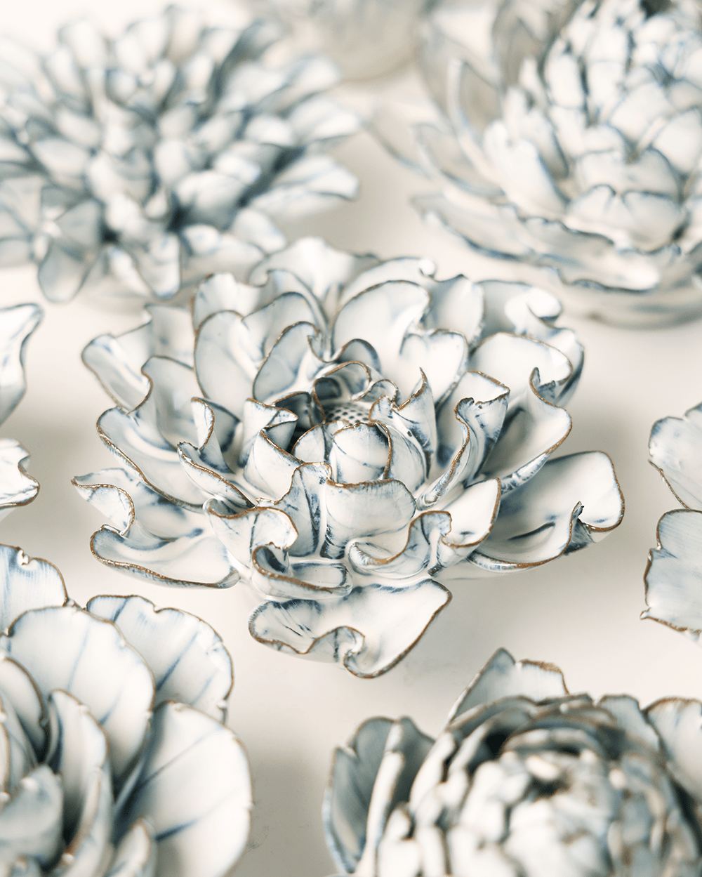Blue White Hawthorn ceramic wall flower styled on wall — Coastal Collection — Chive Studio Toronto