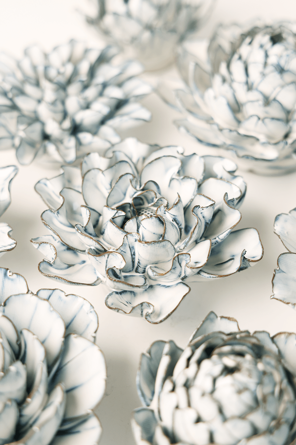 Blue White Hawthorn ceramic wall flower styled on wall — Coastal Collection — Chive Studio Toronto