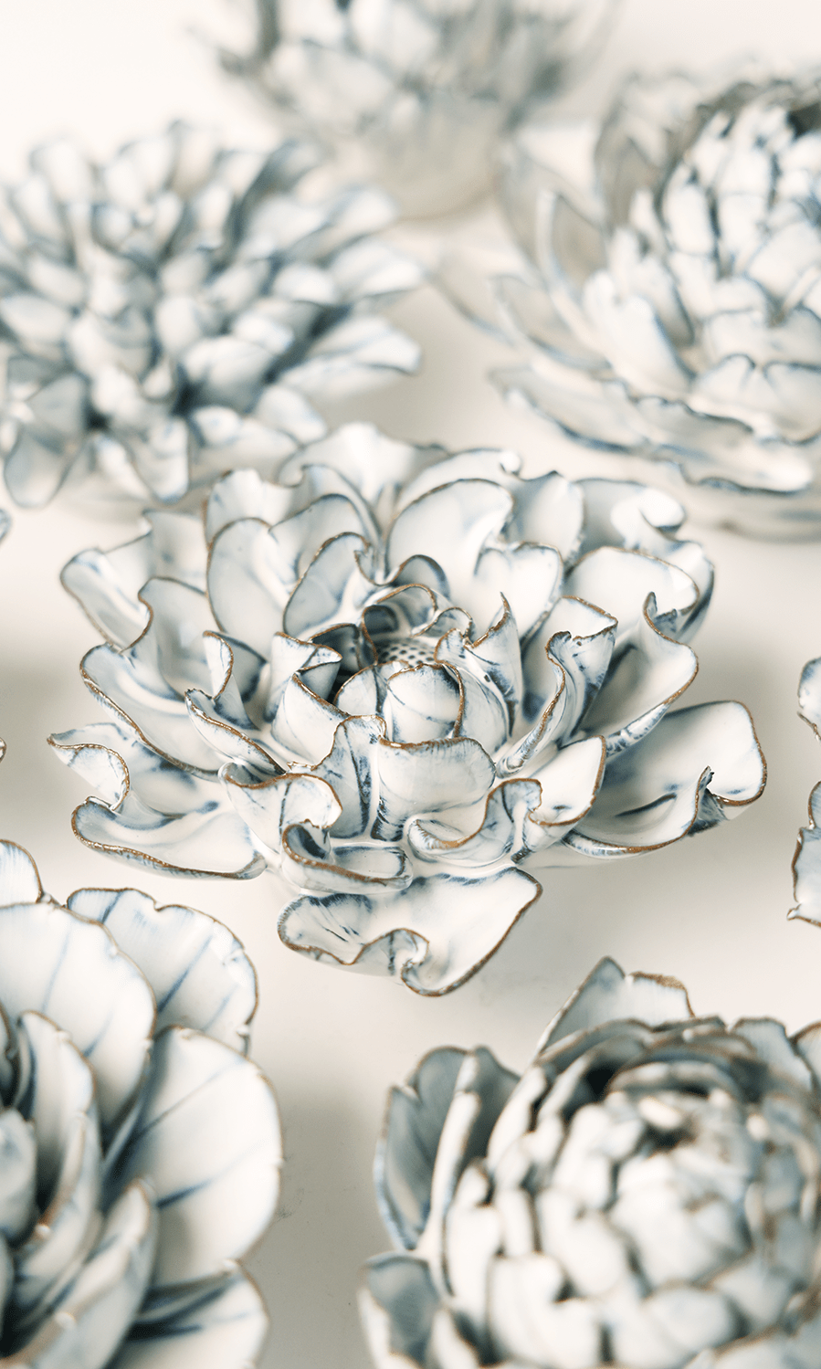 Blue White Hawthorn ceramic wall flower styled on wall — Coastal Collection — Chive Studio Toronto