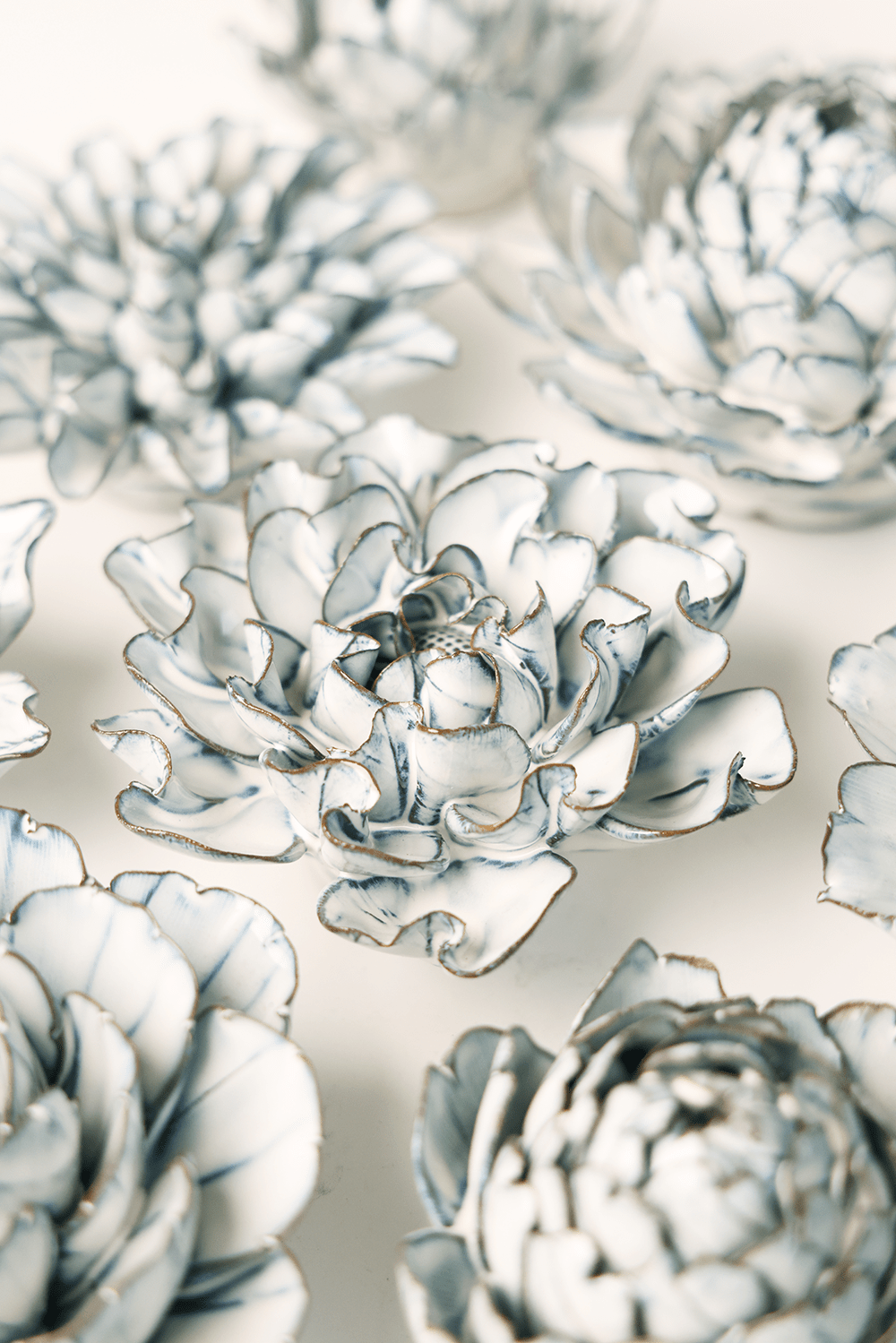 Blue White Hawthorn ceramic wall flower styled on wall — Coastal Collection — Chive Studio Toronto