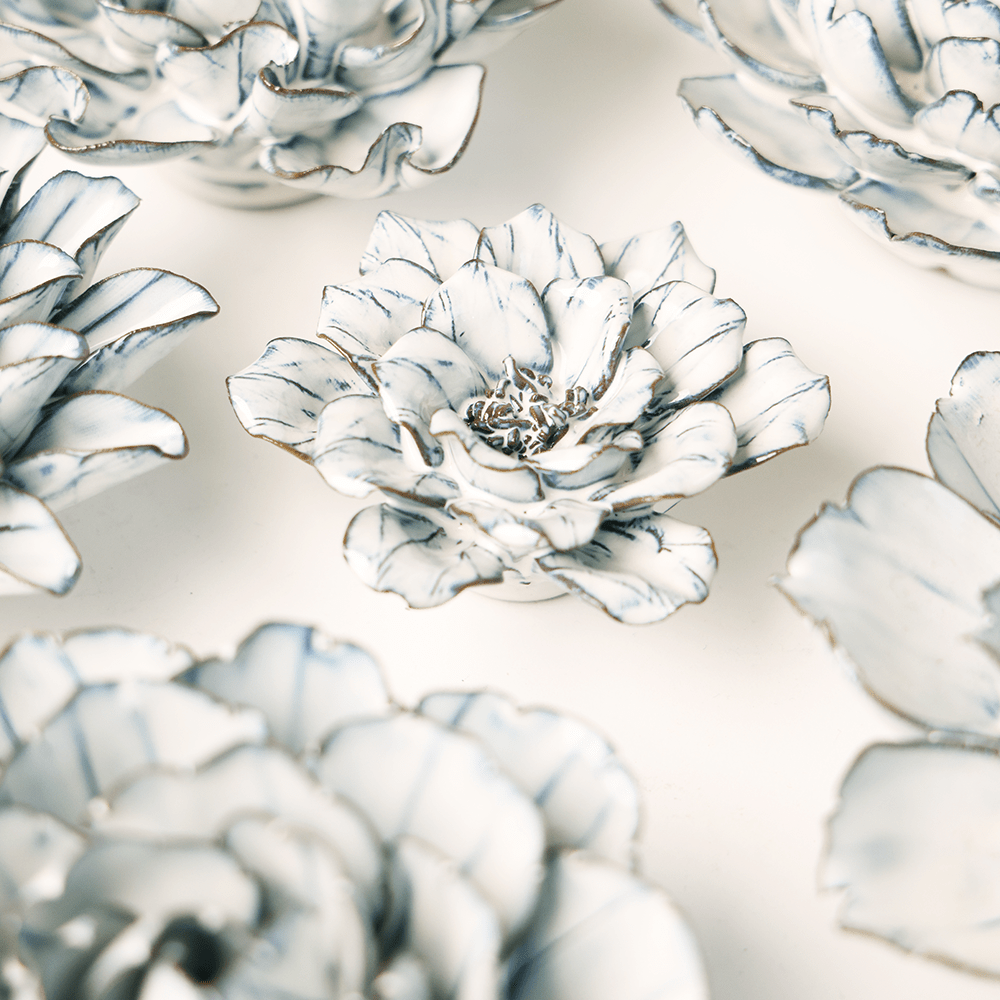Blue White Cosmos ceramic wall flower styled on wall — Coastal Collection — Chive Studio Toronto