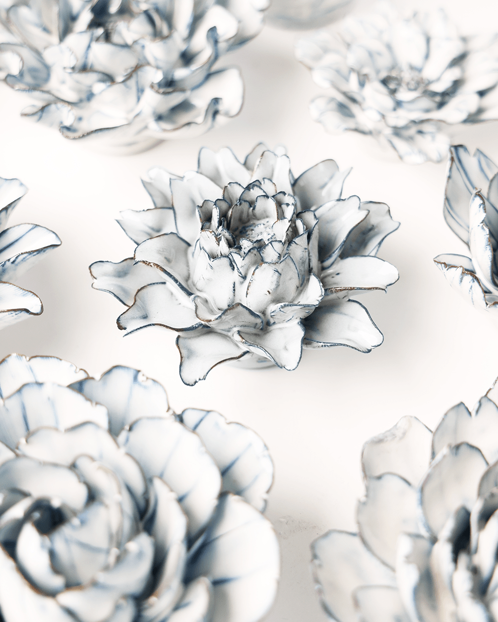 Blue White King Protea ceramic wall flower styled on wall — Coastal Collection — Chive Studio Toronto
