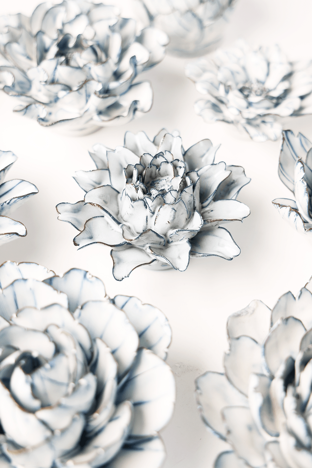 Blue White King Protea ceramic wall flower styled on wall — Coastal Collection — Chive Studio Toronto