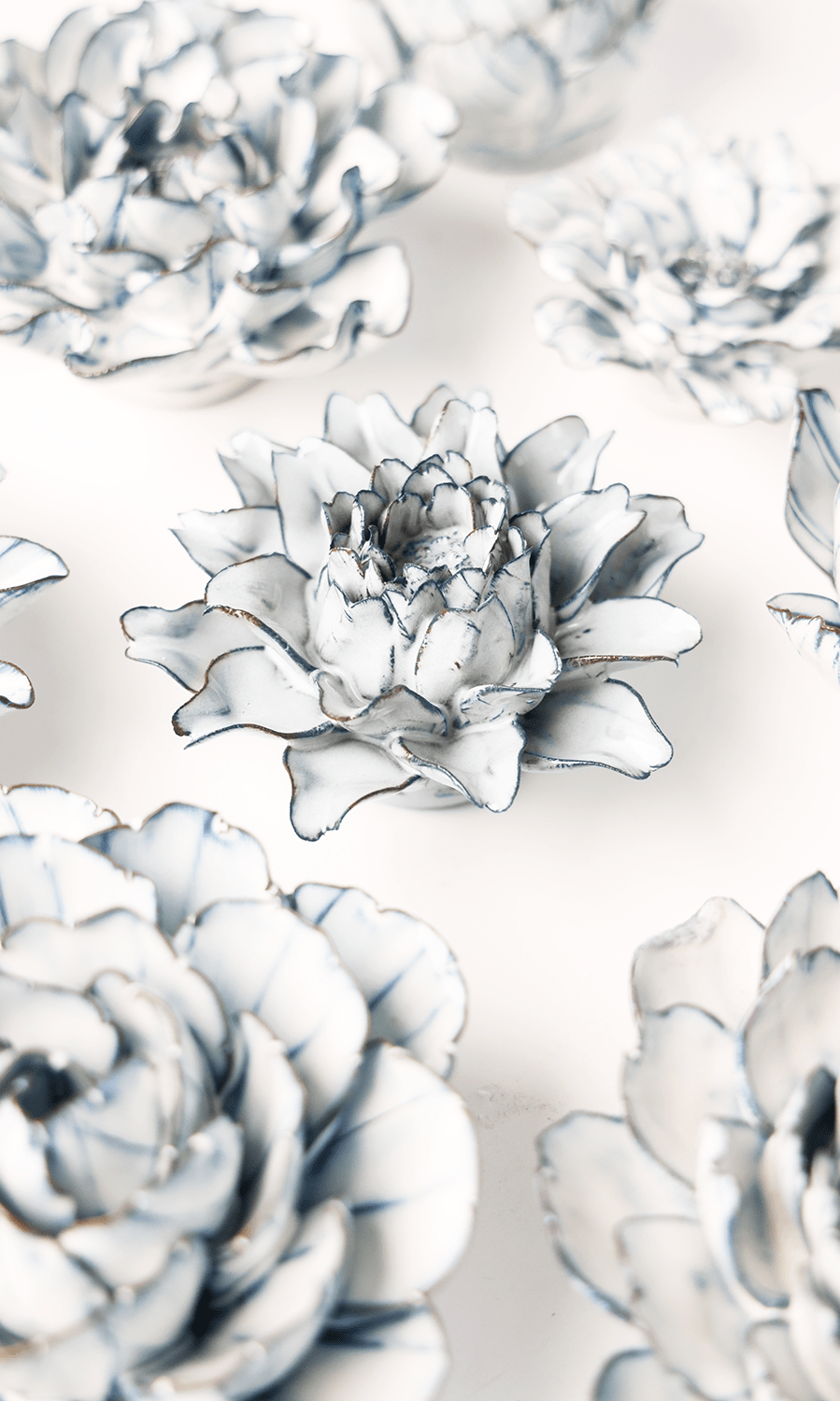 Blue White King Protea ceramic wall flower styled on wall — Coastal Collection — Chive Studio Toronto