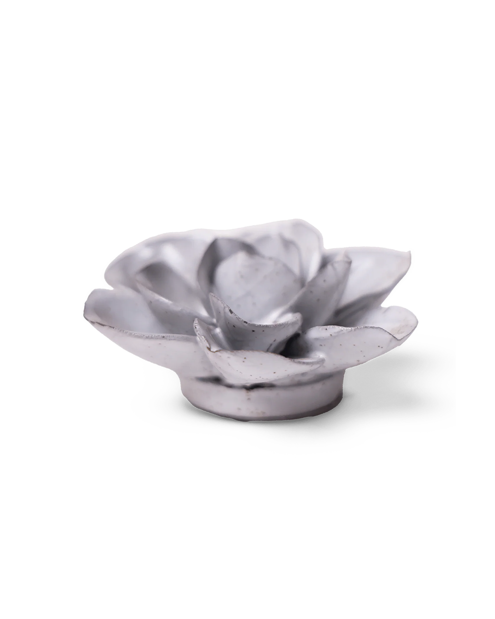 A small sculptural flower-shaped object in a matte light gray finish with subtle speckling, photographed on a clean white background.