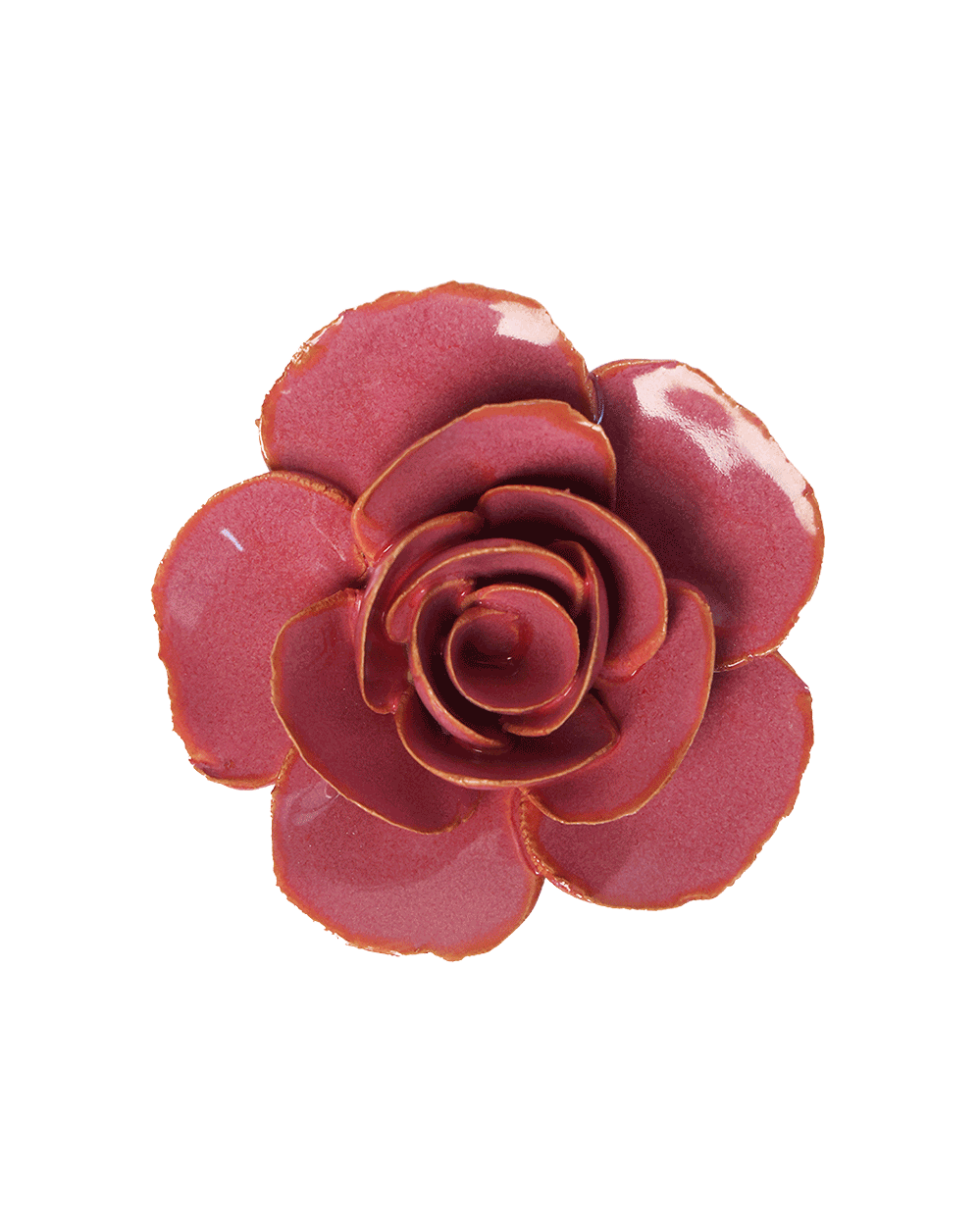 A glossy rose-shaped decorative object or accessory in a deep pinkish-red color with a subtle gold-toned edge, isolated on a solid black background.