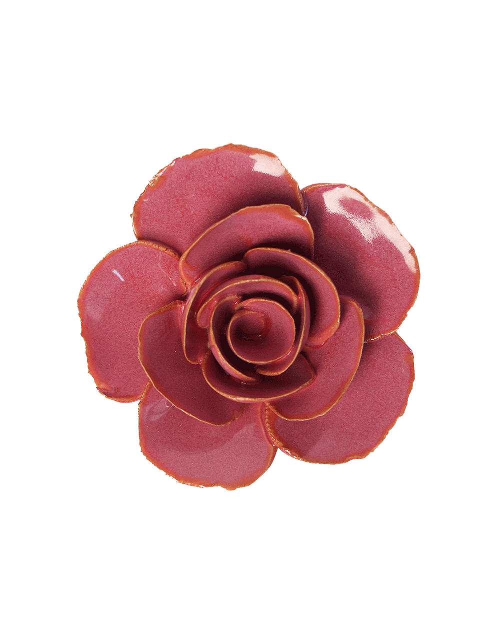 A glossy rose-shaped decorative object or accessory in a deep pinkish-red color with a subtle gold-toned edge, isolated on a solid black background.