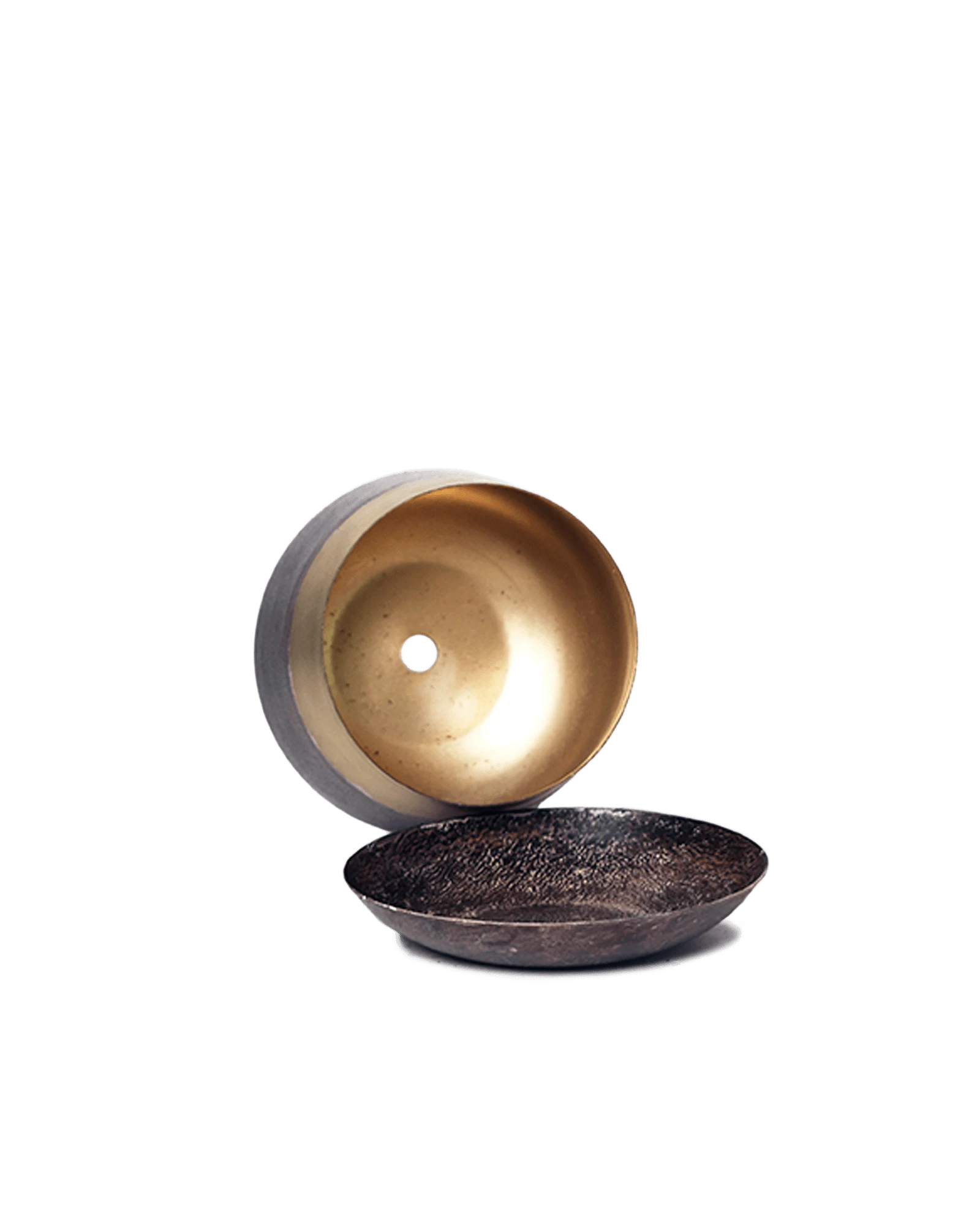 Close up of Chive Joe small brown gold color metal plant pot drainage hole and detachable saucer.