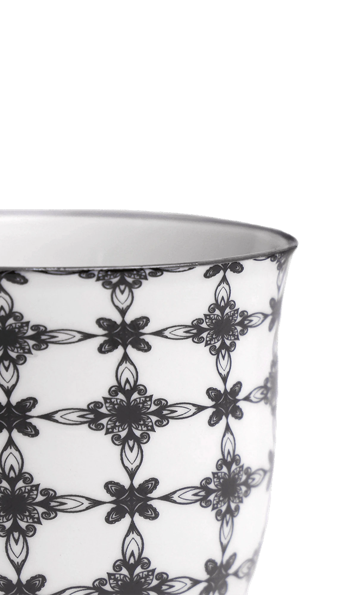 Close-up of the Chive Liberte small black stars porcelain pot showing the pattern and glaze finish.