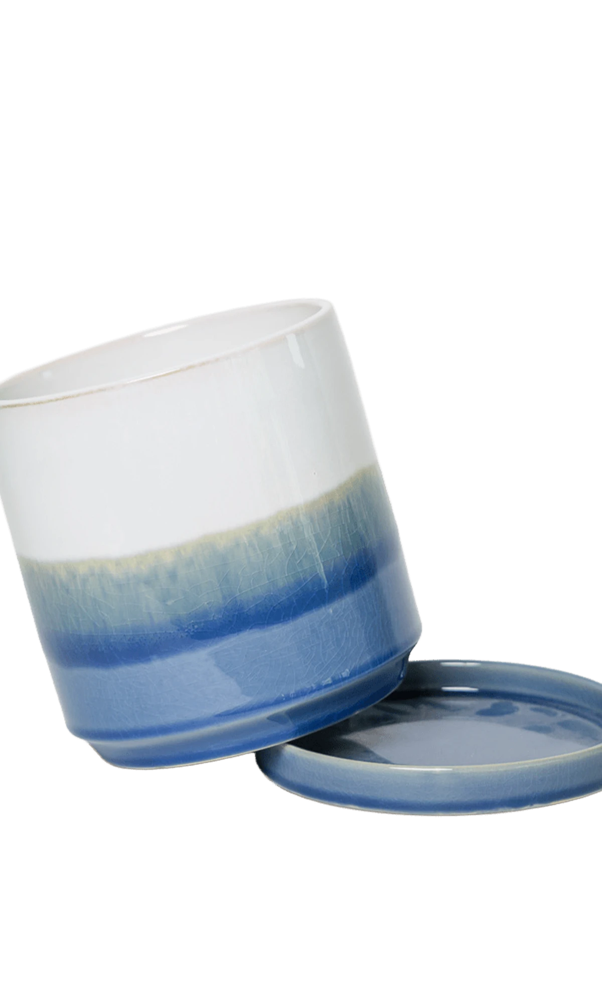 Close-up of the detachable saucer and drainage on a Chive Minute small blue layers ceramic pot.