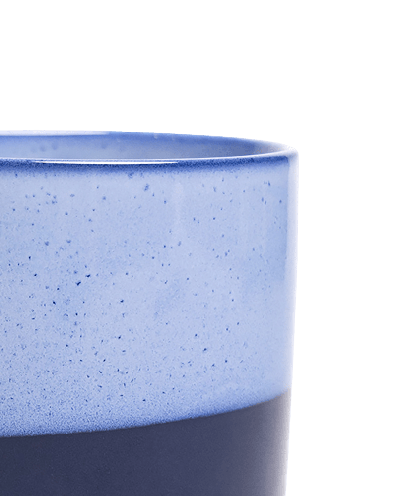 Close-up of the Chive Minute medium cobalt blue ceramic pot showing the color and glaze finish.
