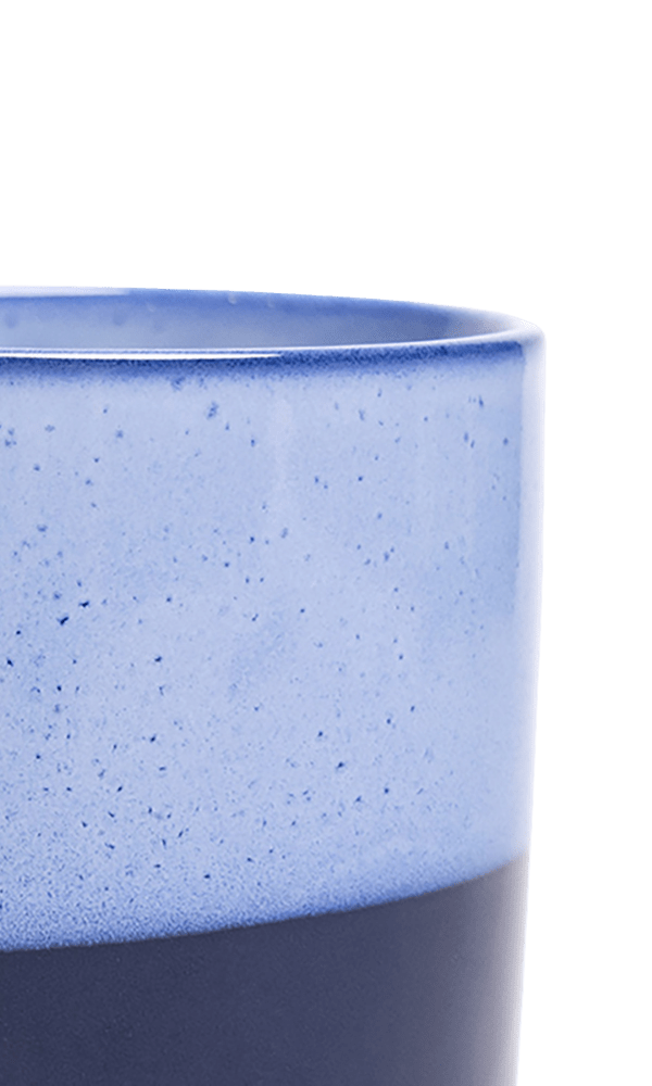 Close-up of the Chive Minute medium cobalt blue ceramic pot showing the color and glaze finish.