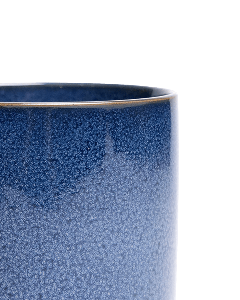 Close-up of the Chive Minute medium cosmos ceramic pot showing the color and glaze finish.