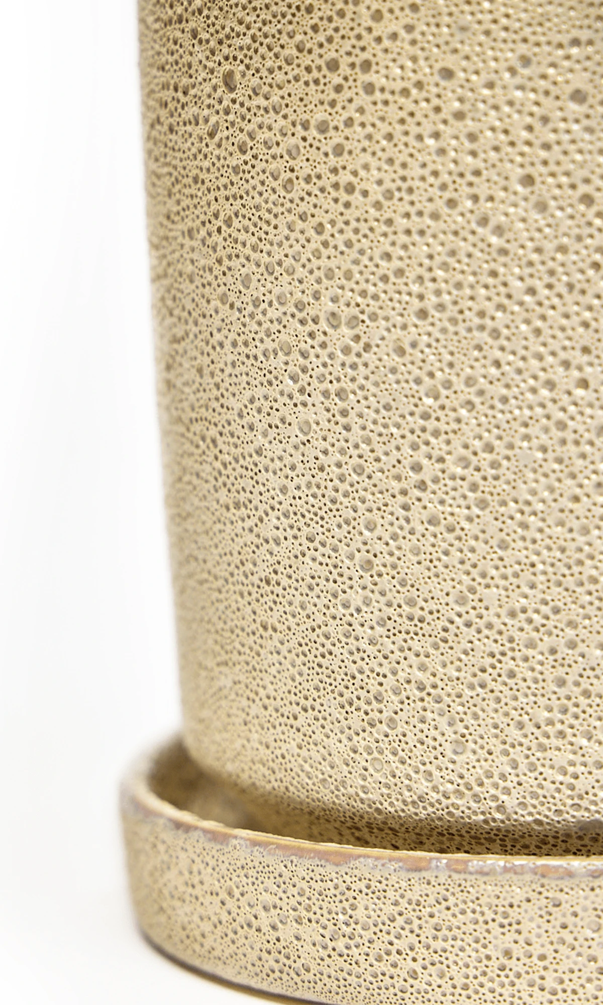Close-up of the Chive Minute small ivory speckles ceramic pot showing glazed details and texture.