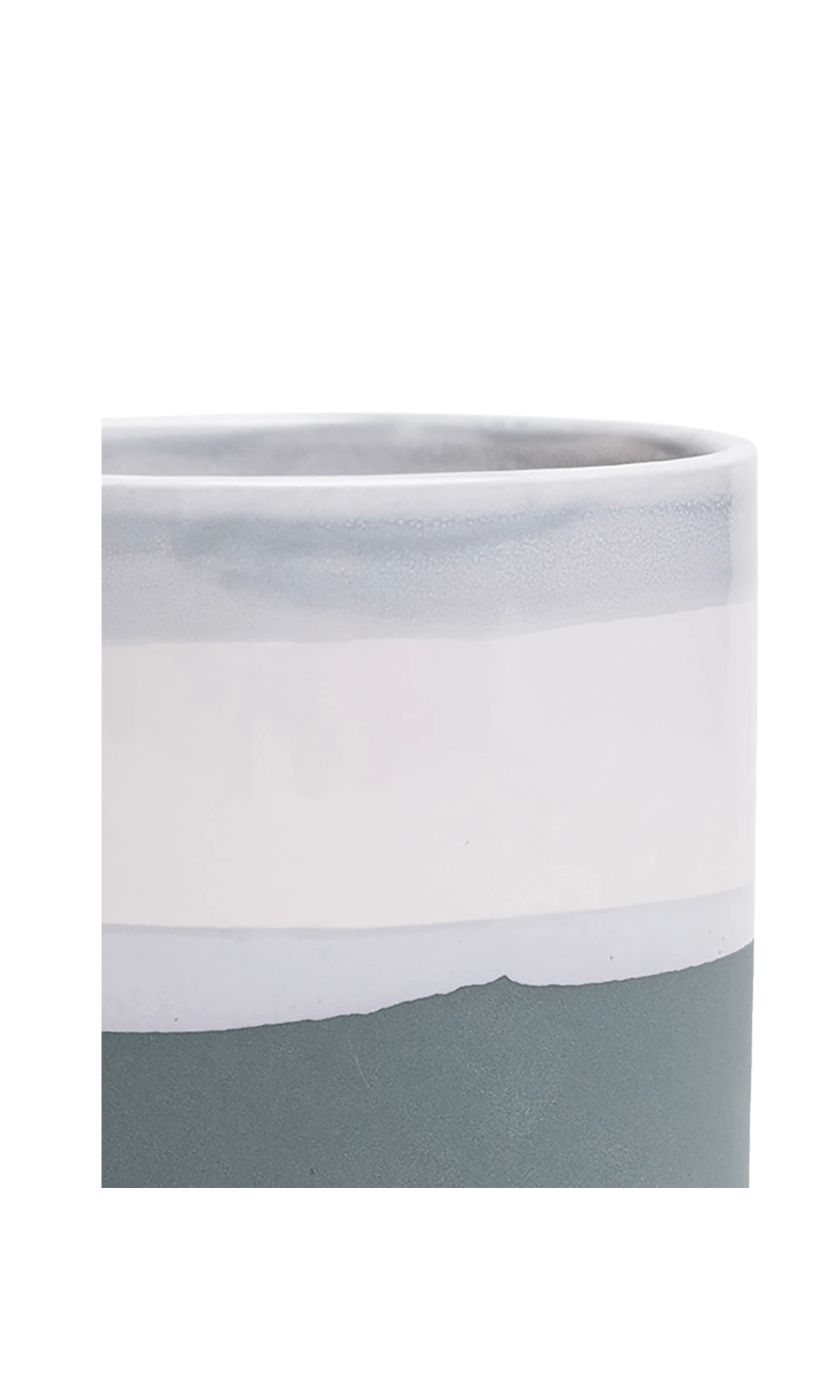 Close-up of the Chive Minute small matte green ceramic pot showing color and glazed finish.
