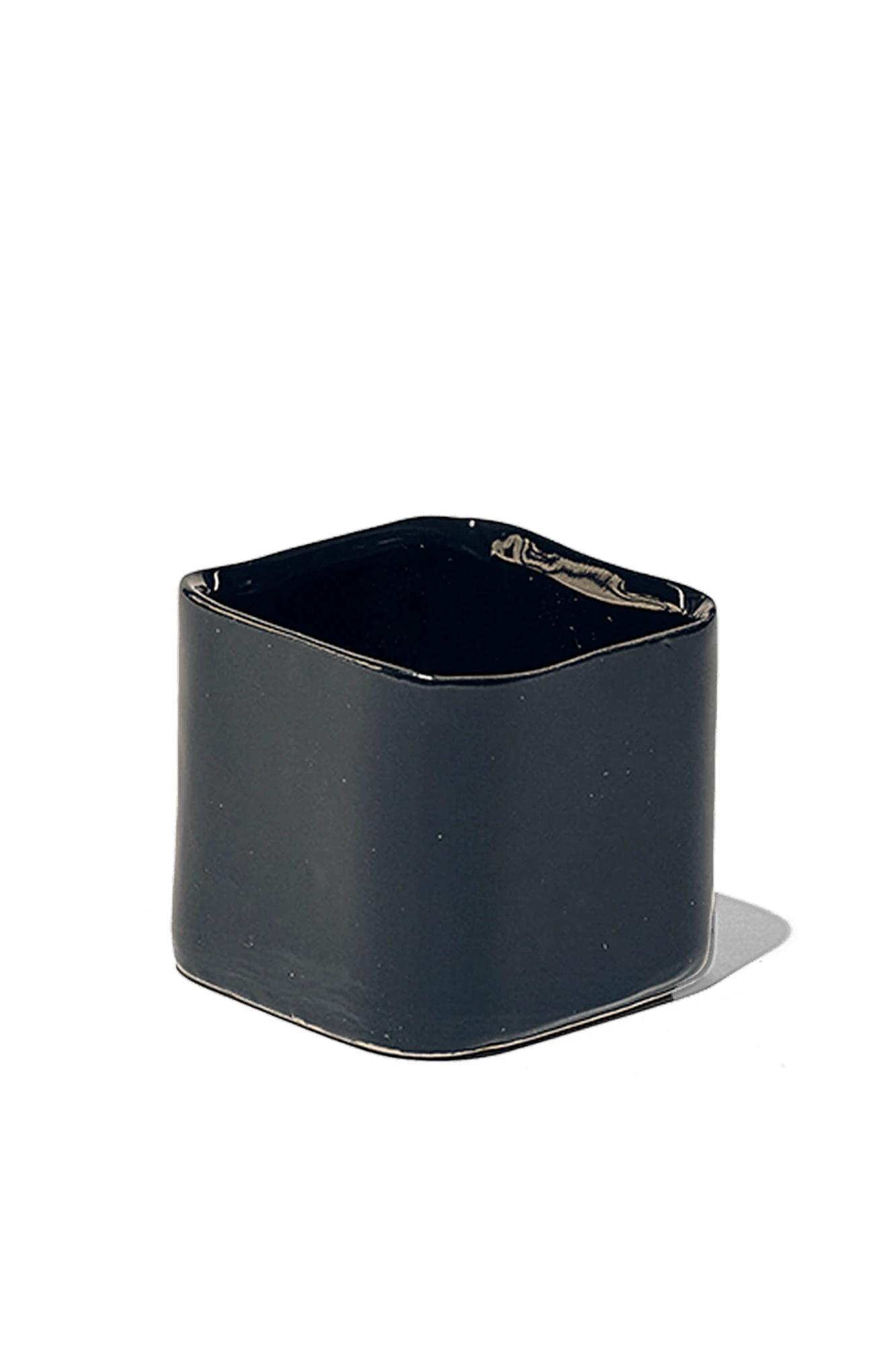 Chive Svek black fully glazed ceramic planter with no drainage.