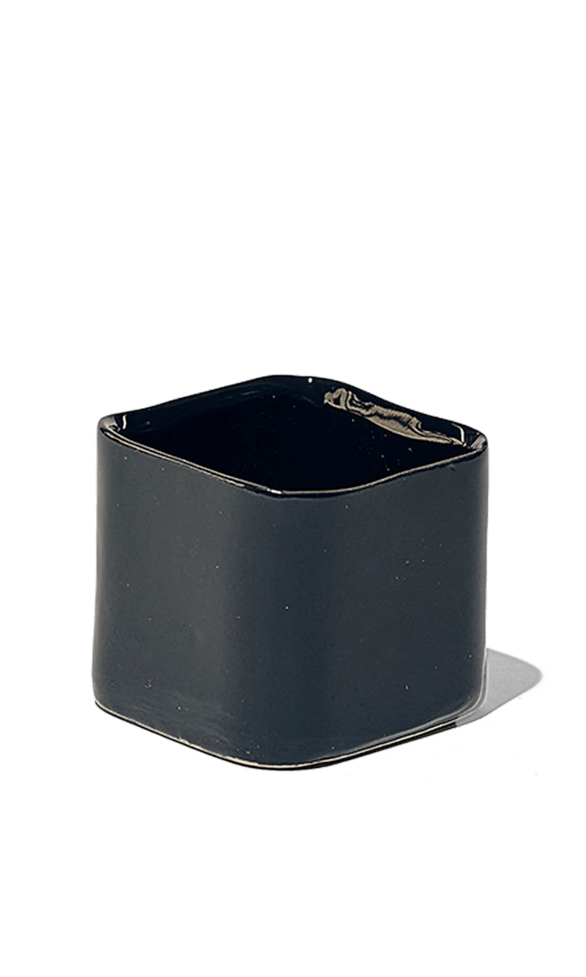 Chive Svek black fully glazed ceramic planter with no drainage.