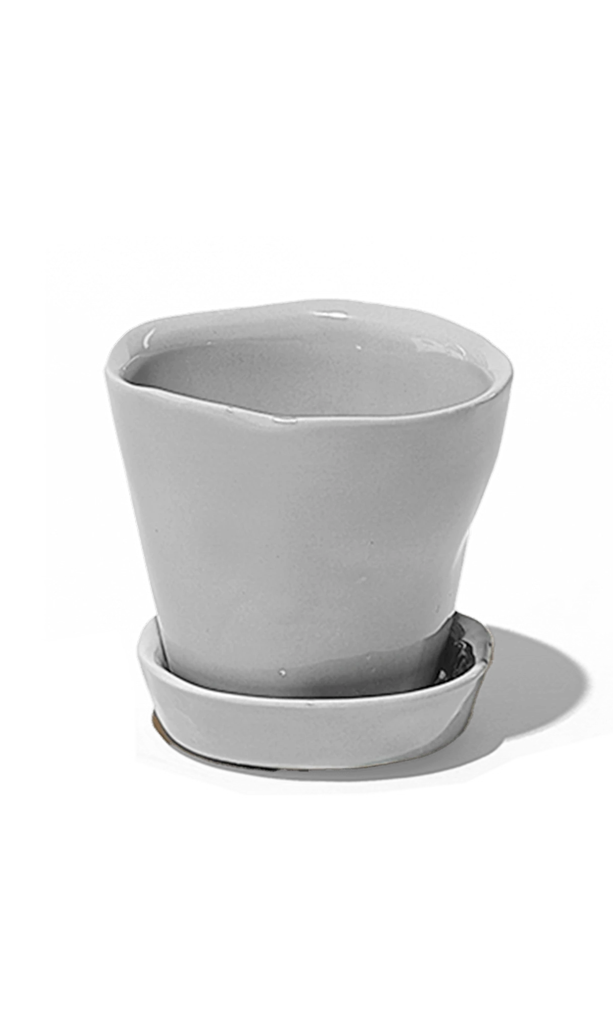 Chive Tika light grey ceramic small plant pot with drainage hole and detachable saucer.