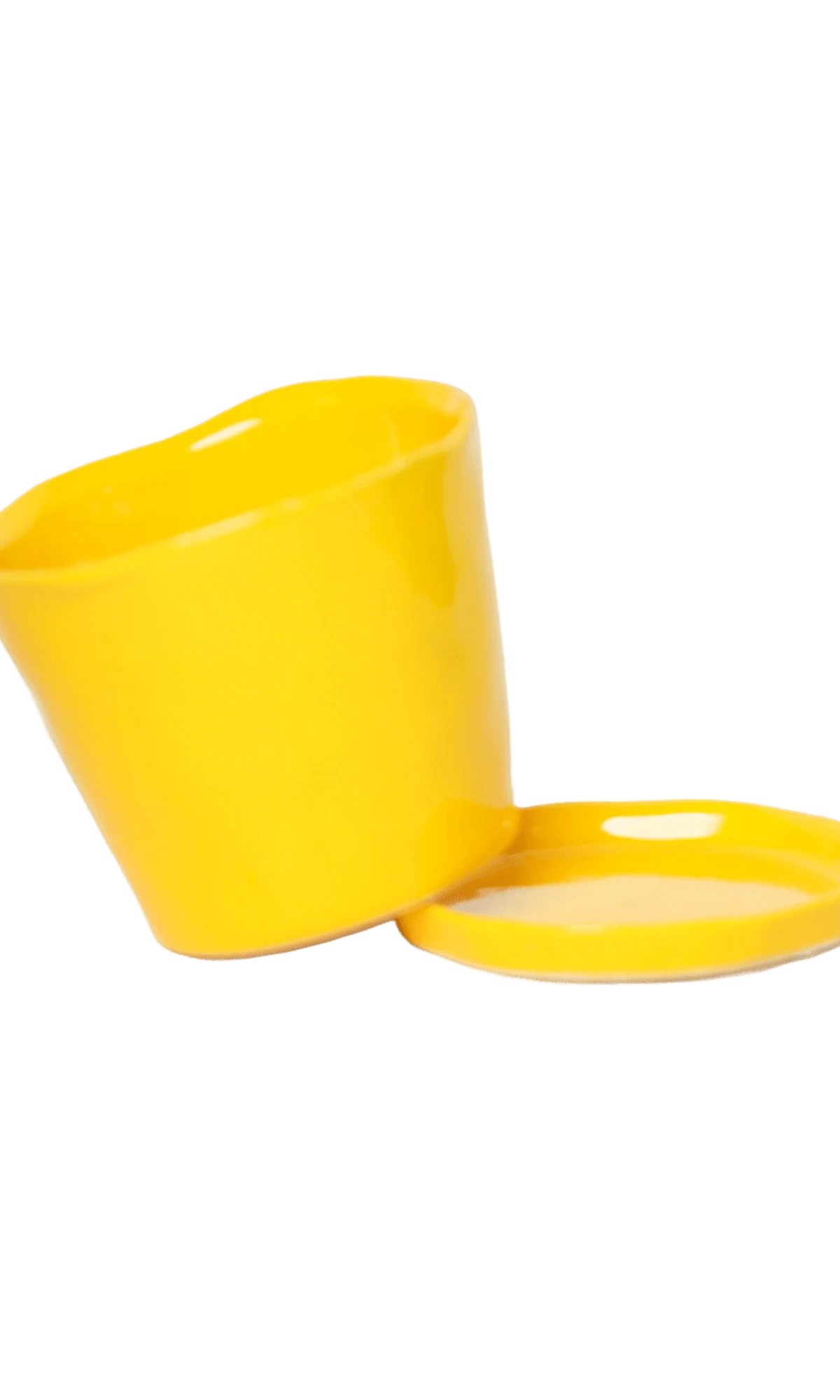 Chive Tika meadowlark yellow ceramic large plant pot with drainage tilted to show the detachable saucer.