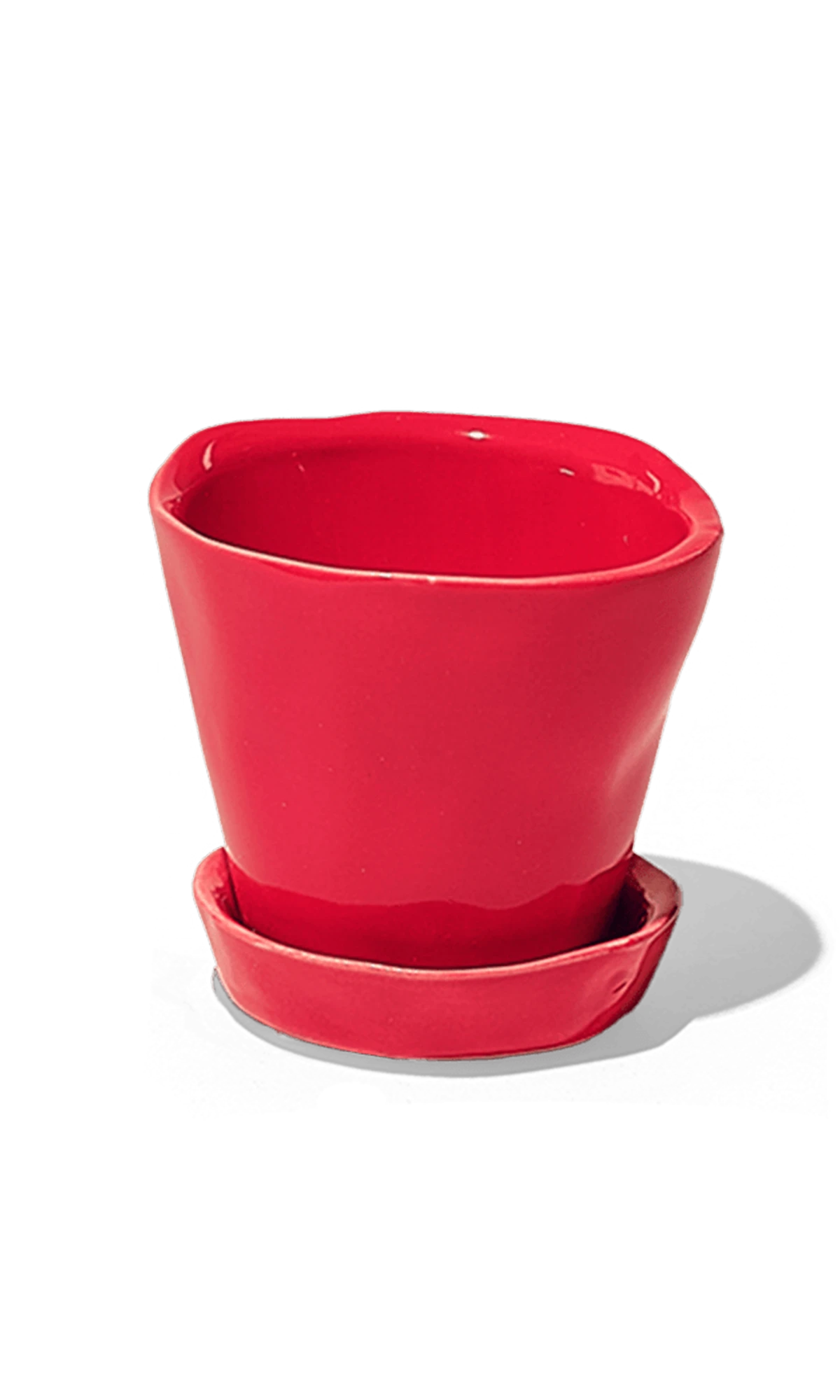 Chive Tika red ceramic small plant pot with drainage hole and detachable saucer.
