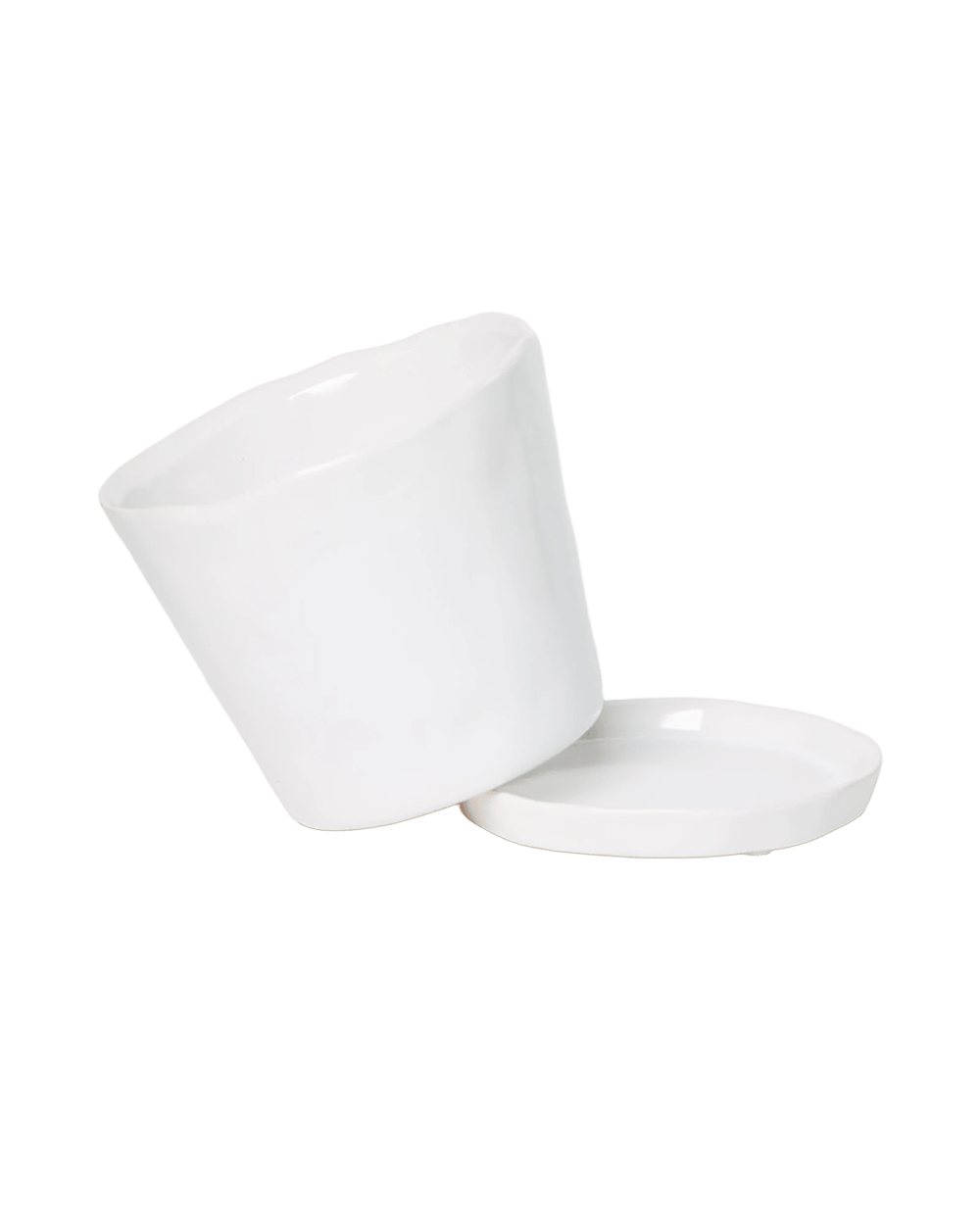 Chive Tika white ceramic large plant pot with drainage tilted to show the detachable saucer.