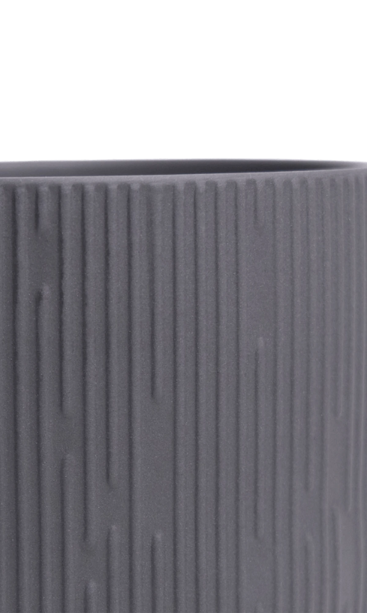 Close-up of the Chive Virago C small black porcelain pot showing the color and ribbed texture finish.