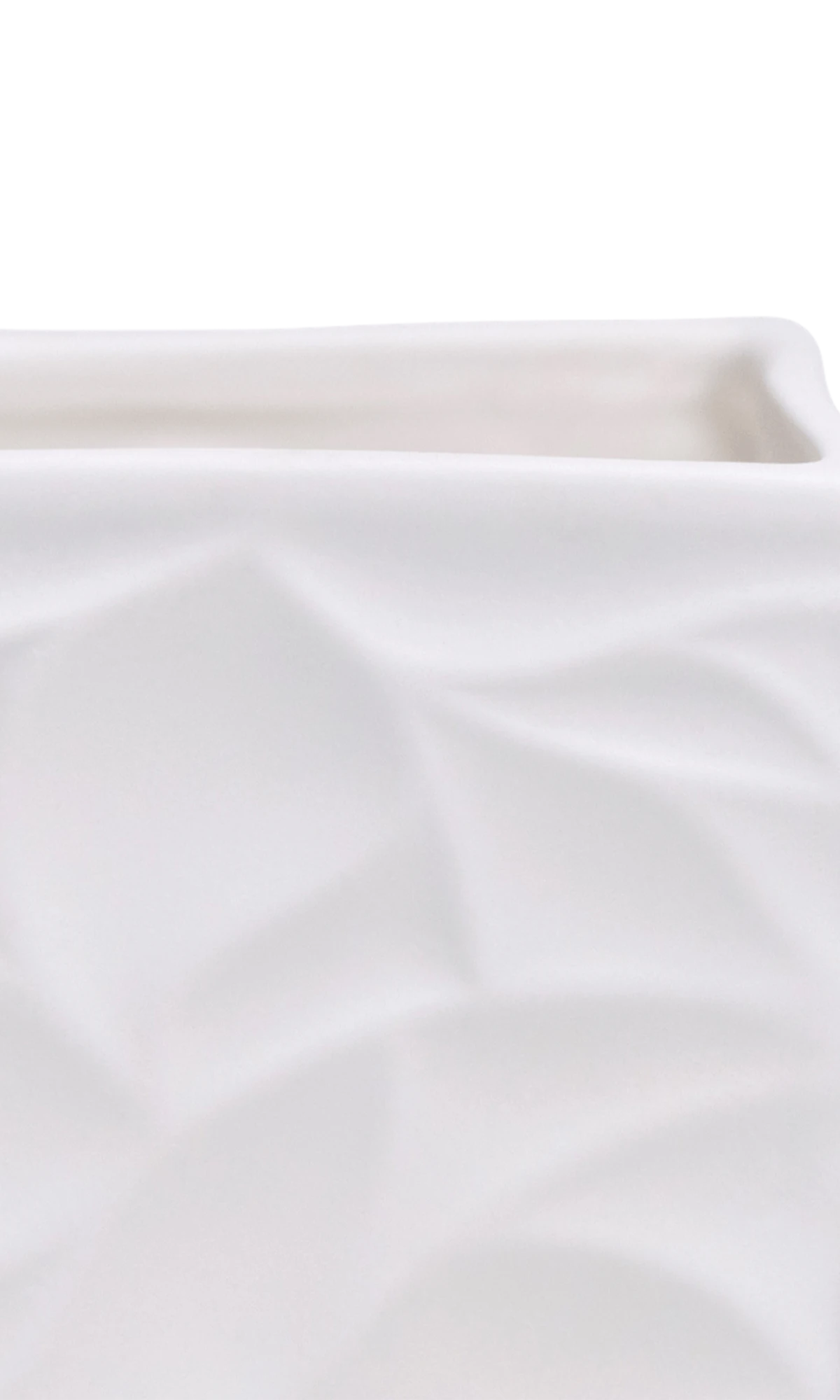 Close-up of the Chive Virago D small white porcelain pot showing the color and geometric texture.