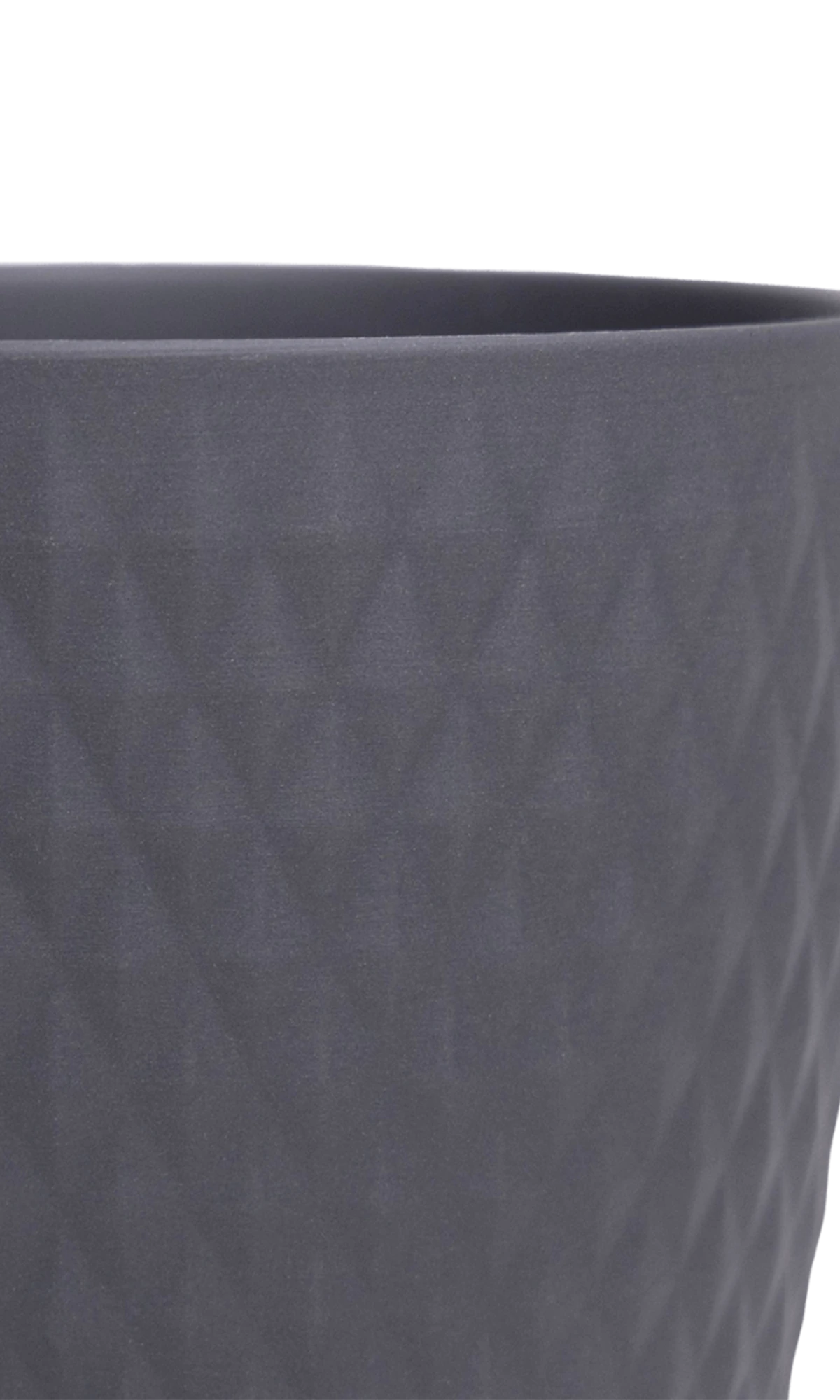 Close-up of the Chive Virago H small black porcelain pot showing the color and diamond-shaped textured finish.