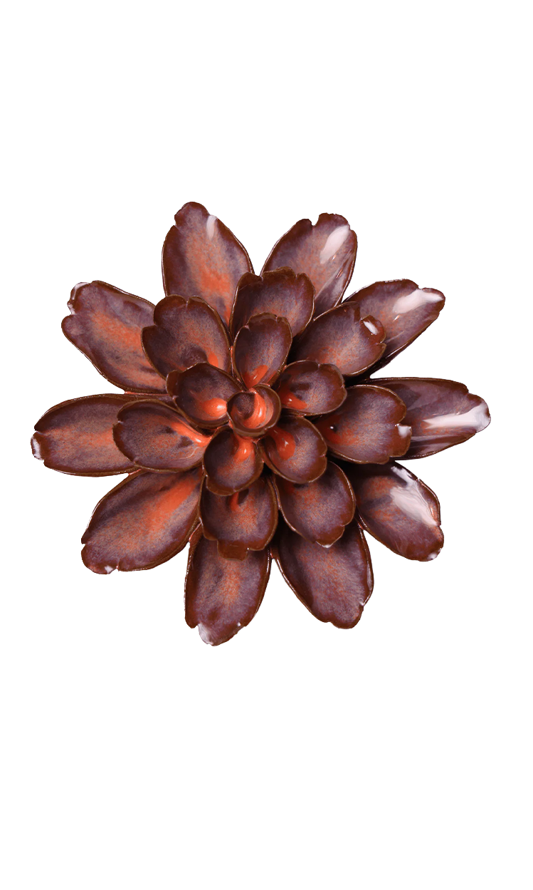 A metallic rose gold succulent flower brooch with layered petals, shown on a solid white background.