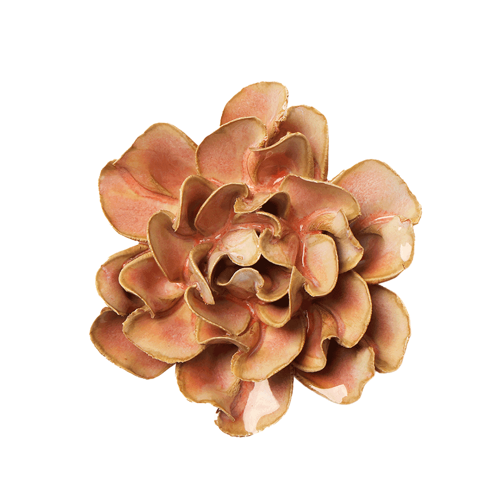A single artificial flower bloom with layered ruffled petals in warm peach, tan, and light brown tones, isolated on a plain white background.