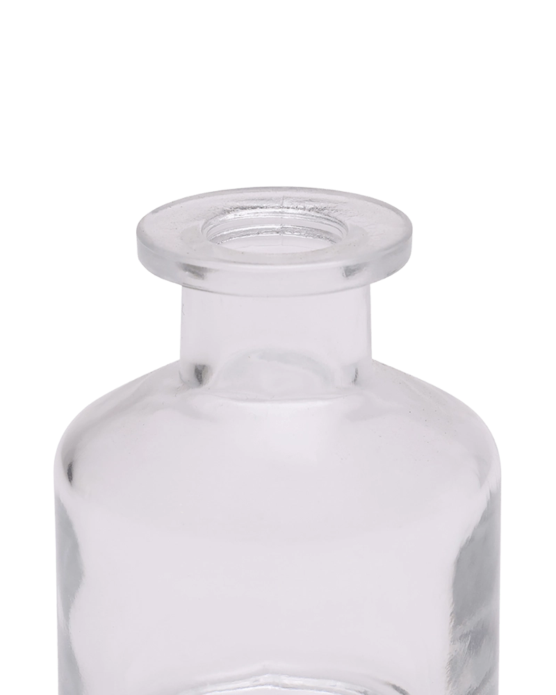 Chive Loft apothecary glass bud vase in clear glass, close-up on the wide flared lip.