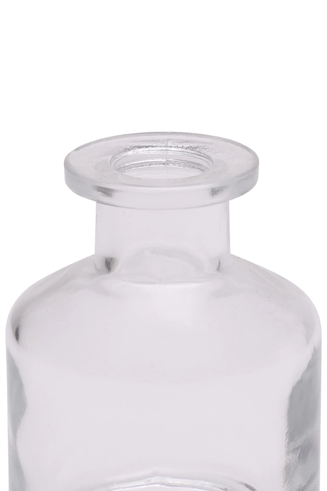 Chive Loft apothecary glass bud vase in clear glass, close-up on the wide flared lip.