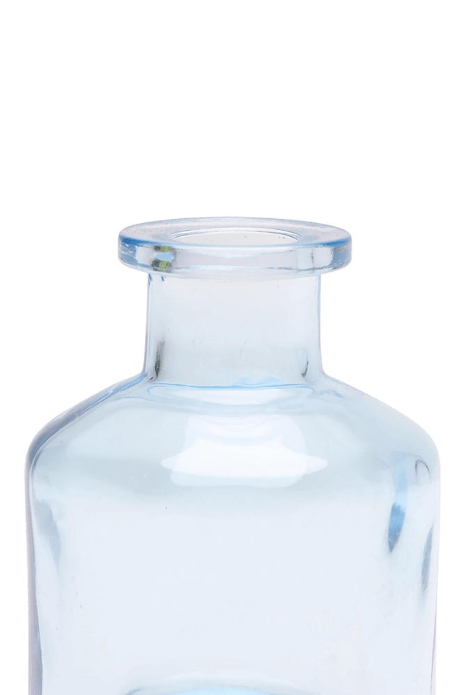 Chive Loft apothecary glass bud vase in light blue, close-up on the wide flared lip.