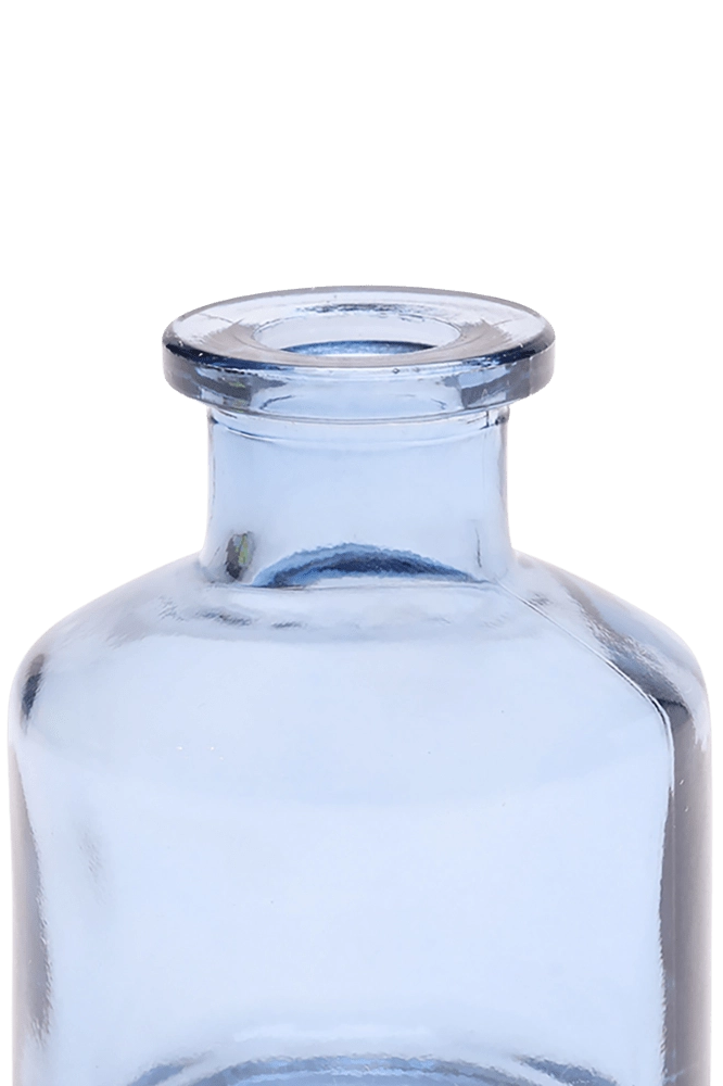 Chive Loft apothecary glass bud vase in medium blue, close-up on the wide flared lip.
