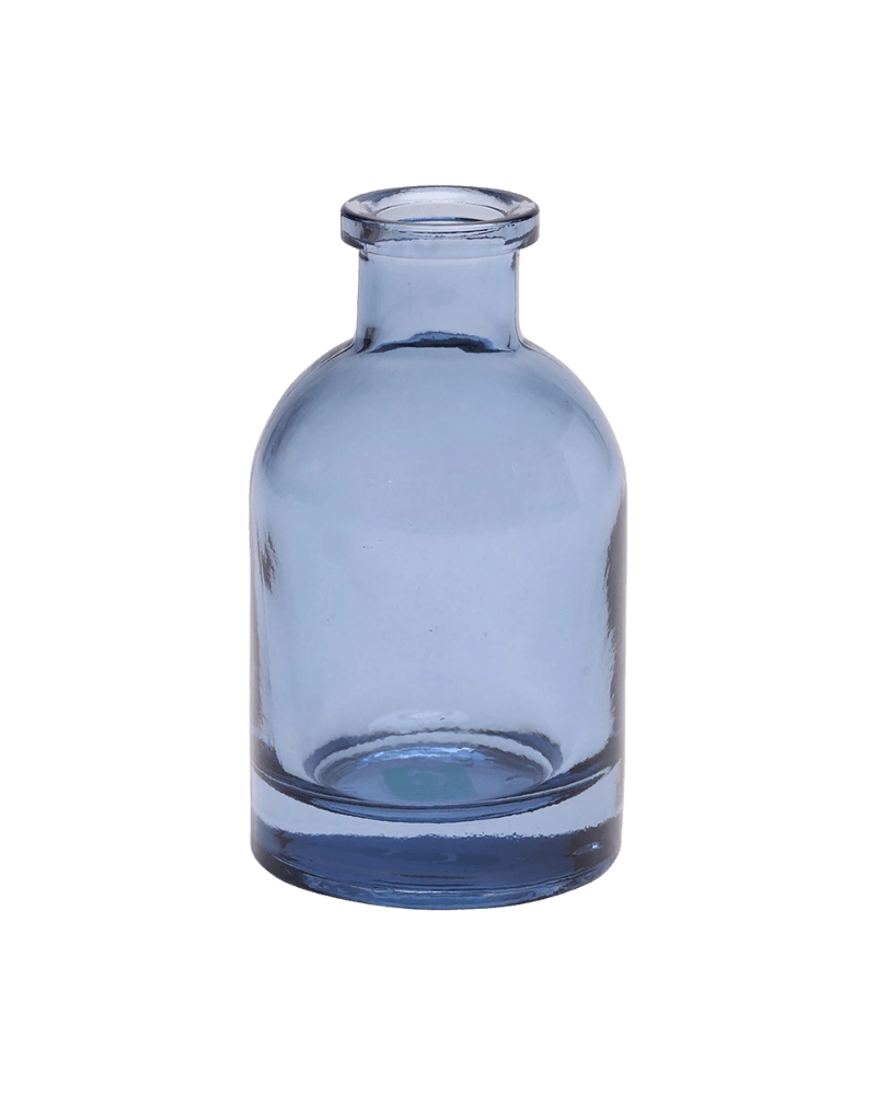 Chive Loft glass bud vase in medium blue with a narrow neck and rounded cylindrical body.