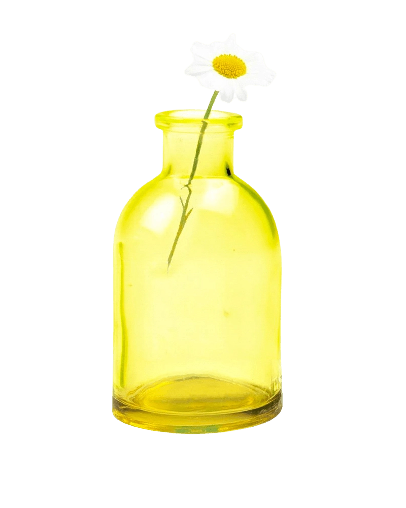Chive Loft glass bud vase in yellow styled with a single white daisy bloom.