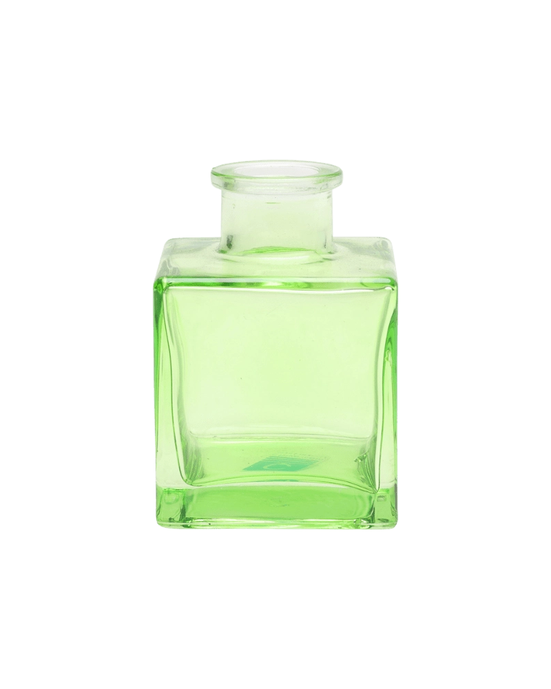 Chive Loft cube glass bud vase in green, straight-on view highlighting the sharp square edges.