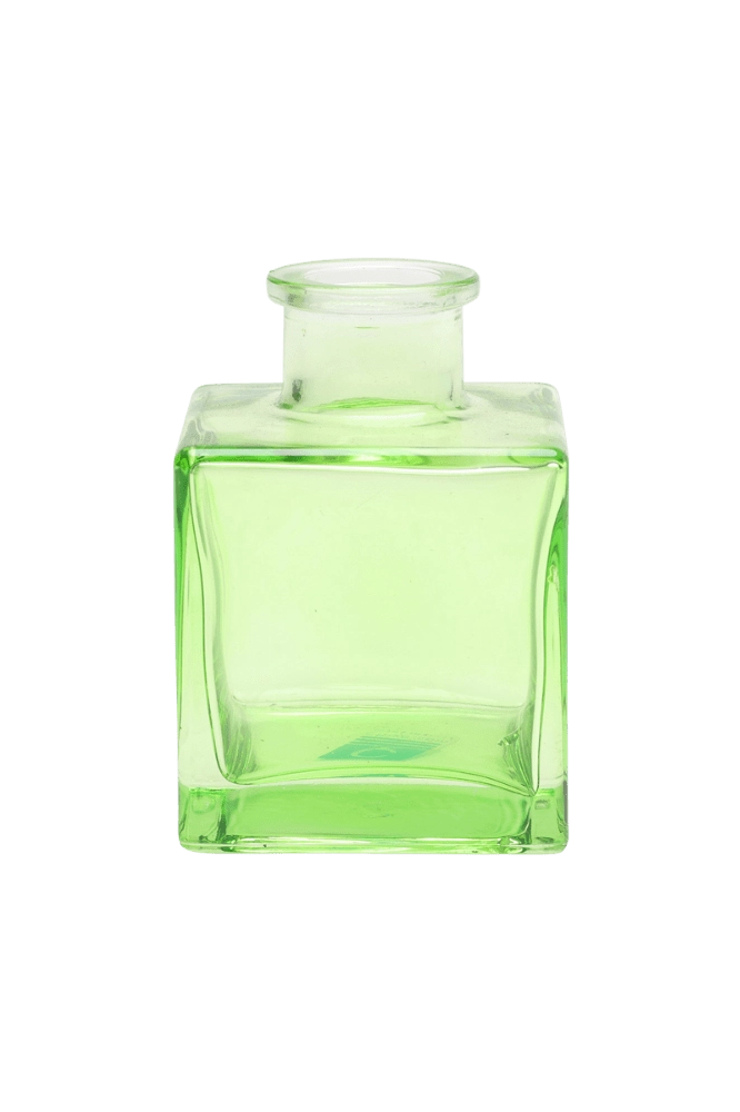 Chive Loft cube glass bud vase in green, straight-on view highlighting the sharp square edges.