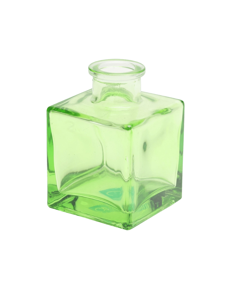 Chive Loft cube glass bud vase in green, straight-on view highlighting the sharp square edges.