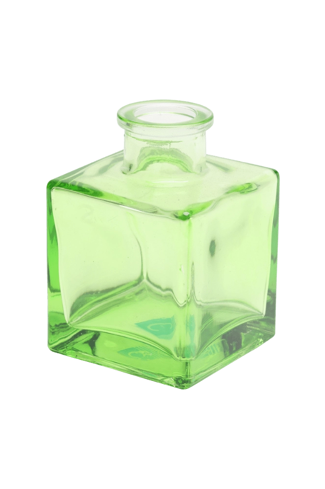 Chive Loft cube glass bud vase in green, straight-on view highlighting the sharp square edges.
