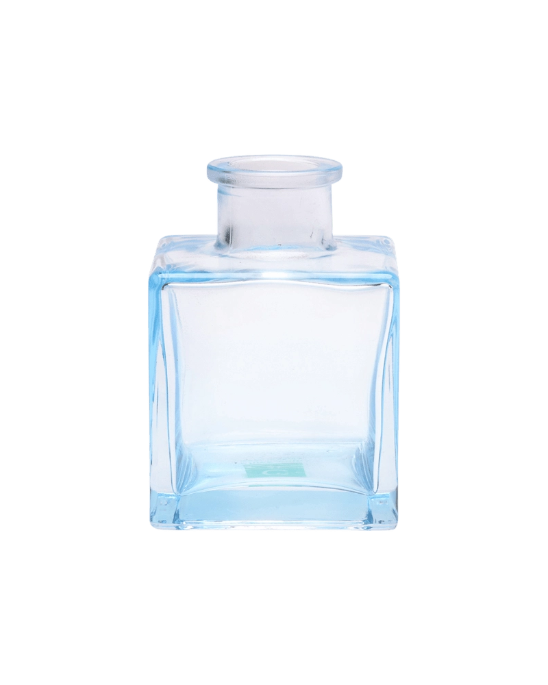 Chive Loft cube glass bud vase in light blue, straight-on view highlighting the sharp square edges.