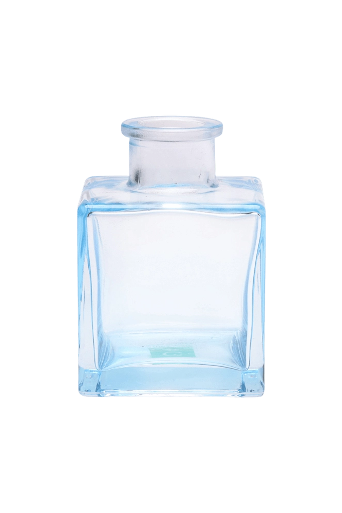 Chive Loft cube glass bud vase in light blue, straight-on view highlighting the sharp square edges.