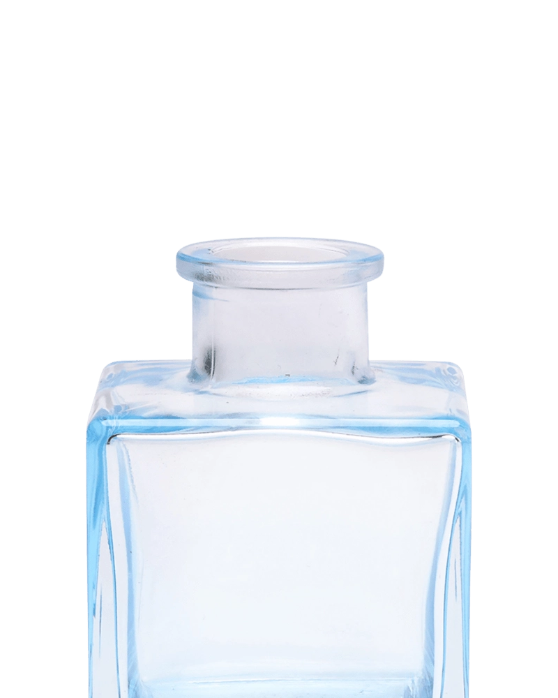 Chive Loft cube glass bud vase in light blue, close-up on the raised collar neck.