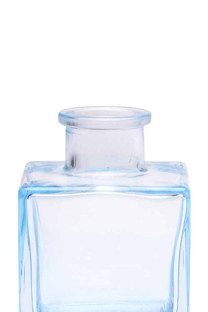 Chive Loft cube glass bud vase in light blue, close-up on the raised collar neck.