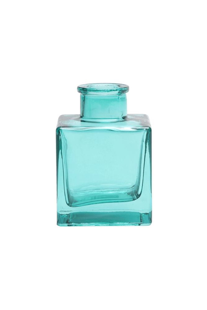 Chive Loft cube glass bud vase in teal with a raised collar neck and clean square silhouette.
