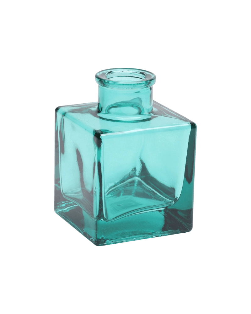 Chive Loft cube glass bud vase in teal, straight-on view highlighting the sharp square edges.