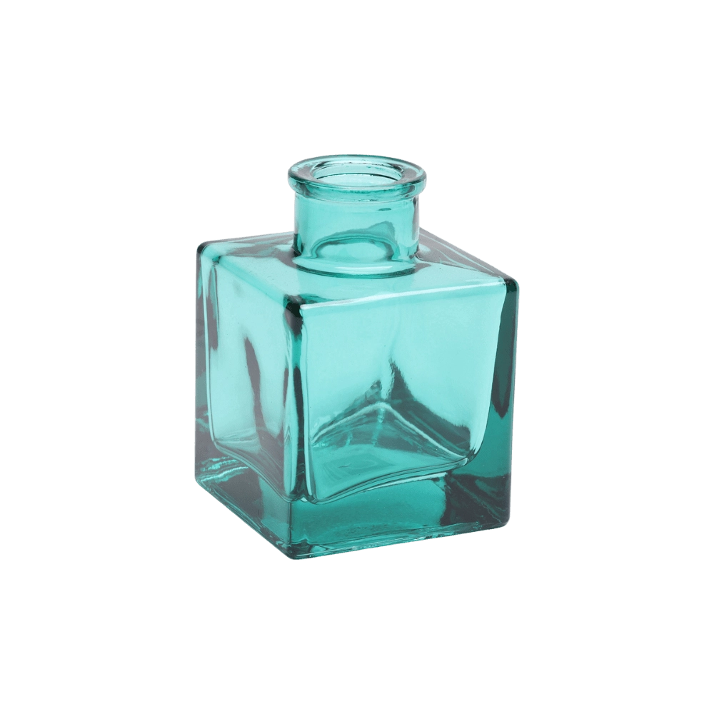 Chive Loft cube glass bud vase in teal, straight-on view highlighting the sharp square edges.