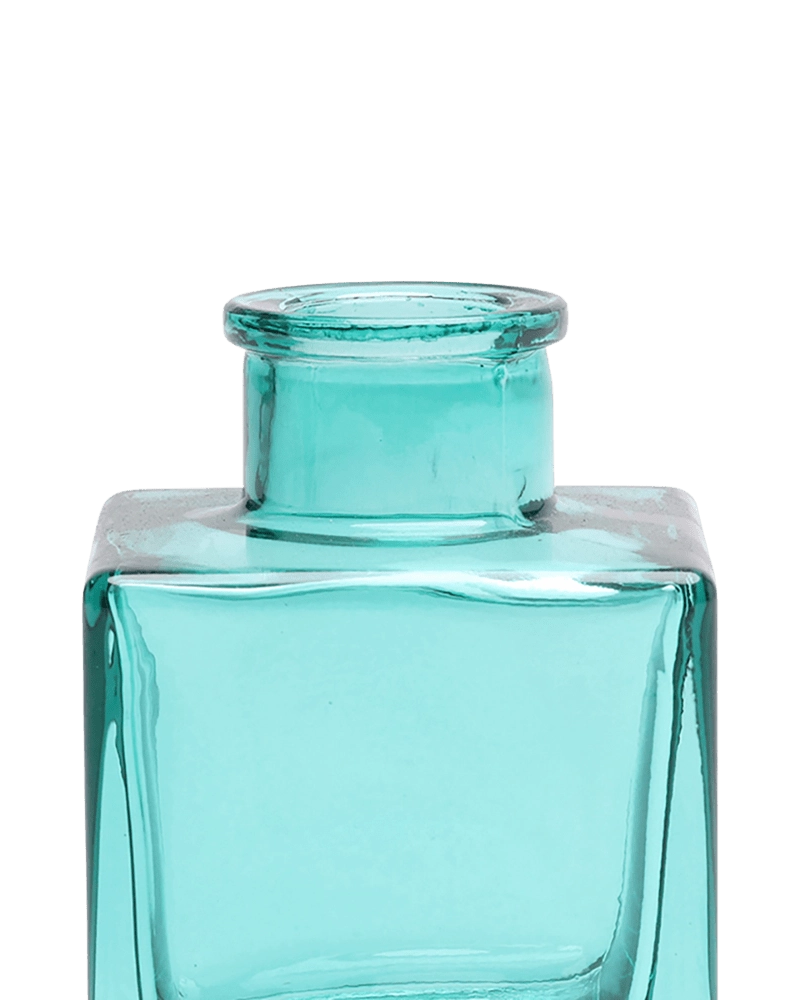 Chive Loft cube glass bud vase in teal, close-up on the raised collar neck.
